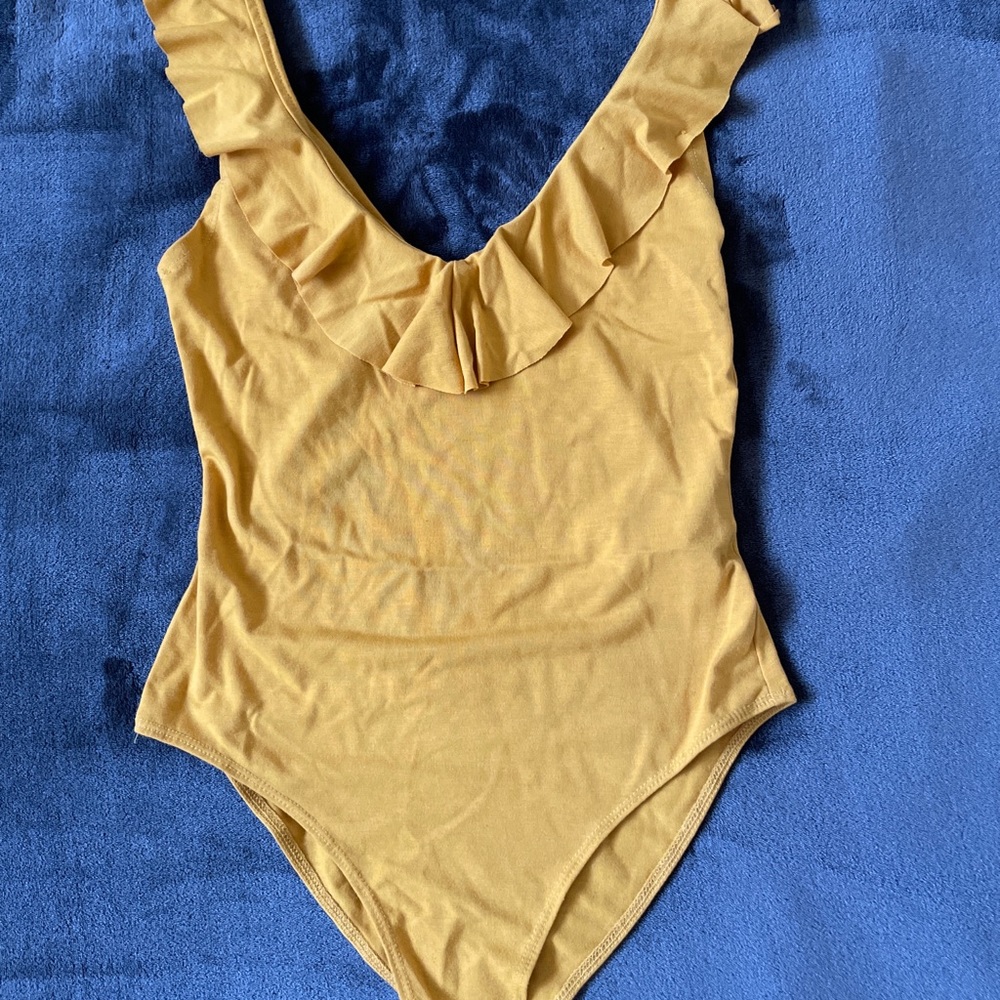 Yellow body suit